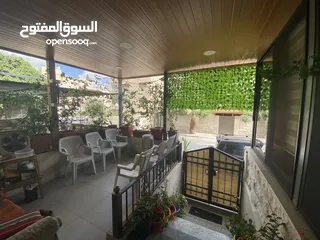  18 عماره ثلاث طوابق وروف بمواصفات خاصه للبيع في جبل الحسين