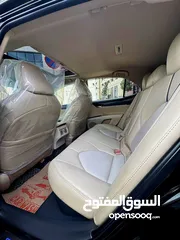  18 تويوتا كامري 2021 فل كامل مع فتحة فحص كامل 7 جيد كرت ابيض بحالة الشركة