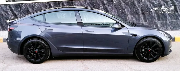  10 تيسلا 2023 MODEL 3 فحص كامل 4 جـيـد ممشى قليل 20 الف بحالة الوكالة لون فيراني مميز بسعر محرووق ولقطة