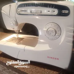  1 ماكينة خياطة سنجر برازيلية بحالة الوكالة