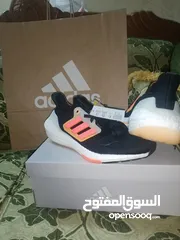  7 حذاء adidas UltraBoost 22 Black Flash Orange اصلي بنص سعره بسعر مغري جدا الفضل للمشي والراحة