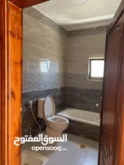  15 شقه طابقيه غير مسكونه للبيع فالكرك منطقه المرج