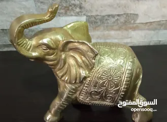  16 فيل نحاس منقوش