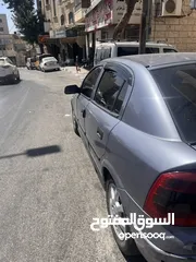  3 اوبل استرا 2004