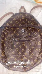  1 Louis Vuitton bag