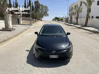  5 تويوتا كورولا 2020 هايبرد لون اسود حره باسم المستورد