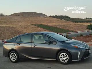  11 تويوتا بريوس 2020 حره باسم المستورد لون فيراني بطاريه ليثيوم بسعر مغري جدا