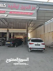  17 كراج عزالدين ارشيد متخصص في برمجة السيارات الحديثة ومختص في صيانة الهايبرد