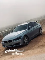  2 Bmw 320 i blue