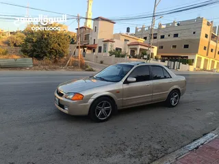  12 مازدا 323 اتماتك فتحه اصليه تحفه بمعنا الكلمه بسعر حرق 29500 ألف نقدا بدل وارد فحص نخب