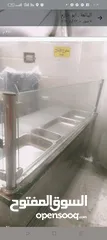  2 ماكينة عصير  ،ثلاجة  ،مقلى  و جريل
