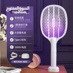  1 مضرب ناموس كهربائي مع قاعدة لقتل جميع أنواع الحشرات المزعجة.شبكة كهربائية من 3 طبقات.