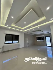 2 شقة ثالث مع روف مع ترس  بالاقساط بتشطيب فندقي في تلاع العلي