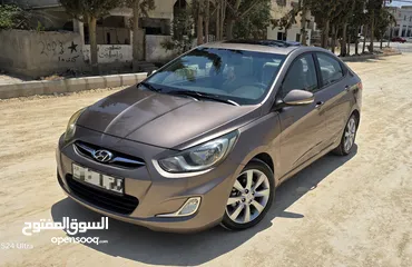  2 للبيع أكسنت 2014 فل مع فتحة أعلى صنف بسعر ممتاز