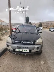  1 هونداي توسان ترخيص 2006 دهان شركه بودي نظيف داخليه نظيفه فحص نخب