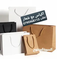  27 بلايز وطواقي موظفين تطريز وكوبي باجات دفاتر
