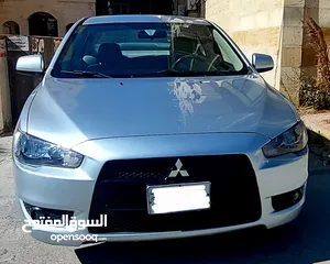  10 ميتسوبيشي لانسر 2014 بحال الوكالة