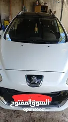  1 بيجو 308 ستيشن 6+1