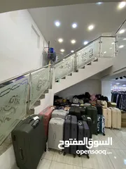  9 محل طابقين للبيع