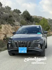  1 هونداي توسان هايبرد