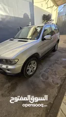  1 سيارة بي ام wx5 مستعملة  موديل 2005 اللون رصاصي