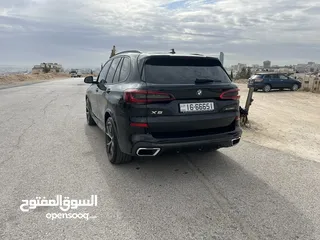  3 بي ام دبليو X5 لون اسود موديل 2022 Mكيت فل كامل فحص كامل وارد وكاله عمان