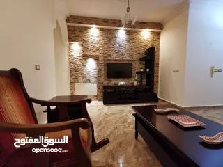  1 شقة مفروشة للإيجار السنوي بأجمل مناطق مرج الحمام خلف القرية الملكية مباشرة.