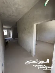  12 شقة أرضية بإطلالة مفتوحة وتشطيب مؤسس — فرصة لتصميم لمساتك الخاصة!
