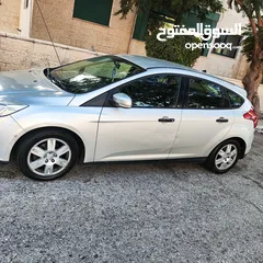  4 فورد فوكس عداد قليل استخدام شخصي يوجد بعض الضربات الخفيفة موديل 2013 هاتش باك