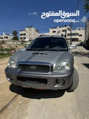  1 هيونداي سنتافيه فل اضافت ماعدا فتحة 7 ركاب اتوماتيك ديزل موديل 2002 فحص 100٪؜ خالي من المشاكل