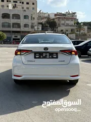  9 تويوتا كارولا ترخيص 2022 محرك 1800 هايبرد جير أوتوماتيك 170 حصان