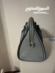  2 Used twice in new like condition medium sized