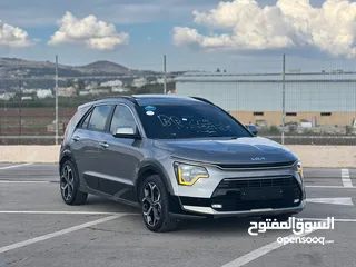  3 كايا نيرو  هايبرد (بنزين+كهرباء ) فل الفل  فتحة سقف  لون مميز اضافات مميزة /2022 جناح اسود