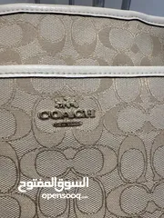  5 Coach signature canvas cross body bag