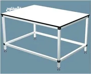  1 طاولة قص و تفصيل الالبسة  Table cutting fabric