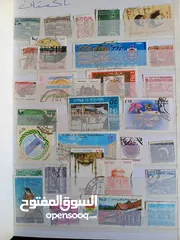  14 طوااابع من جميع دول العالم بنص دينار فقط