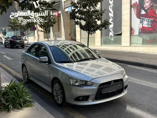  11 لانسر  فحص كامل 7جيد1.6محرك اقتصادي جير أوتوماتيك كت رالي ارت ياباني اصلي كراسي جلد وقماش الياباني