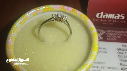  7 خاتم ذهب ابيض 3 فصوص ألماس من دماس - one 18k White and pink gold ring Three Natural Diamonds