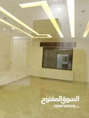  13 لمن يرغب بالسكن أو الاستثمار شقة مع روف فاخرة تشطيب ديلوكس في اجمل مناطق الجبيهة للبيع بسعر مميز