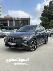  1 هونداي توسان ترخيص 2022 محرك 1600 هايبرد  جير أوتوماتيك 240 حصان