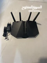  3 Asus 5X4000 Dual Band Wi-Fi Router.
