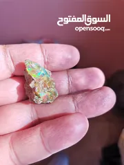  2 حجركريم اوبال ملتي كلر ناري Opal gemstone
