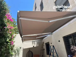  9 مظلة متحركة للمحلات او المنازل