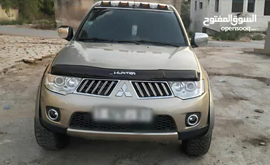  1 تندر ميتسوبيشي هنتر  4×4 ديزل ماطور 2500تيربو  جير عادي  ... موديل 2010