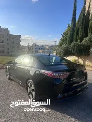  2 كيا اوبتيما.. 2016 ..  هايبرد  .أسود ... للبيع
