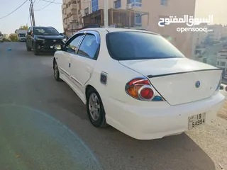  10 كيا سبكترا 2001 MR  فحص جيد وضربه راسيه خلفي للبيع بسعر 2900