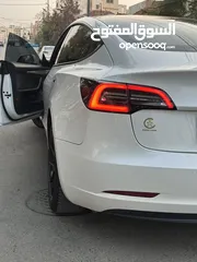  15 تسلا موديل 3 لون أبيض لؤلؤي 2022 Tesla model 3 . 2022