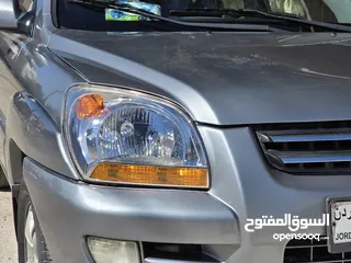  30 كيا سبورتج مع فتحة دفع رباعي kia sportage