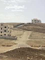  7 أرض على شارع المية ممر عمان التنموي للبيع