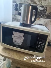 1 مايكرويف سونا 45 لتر شغال عالفحص